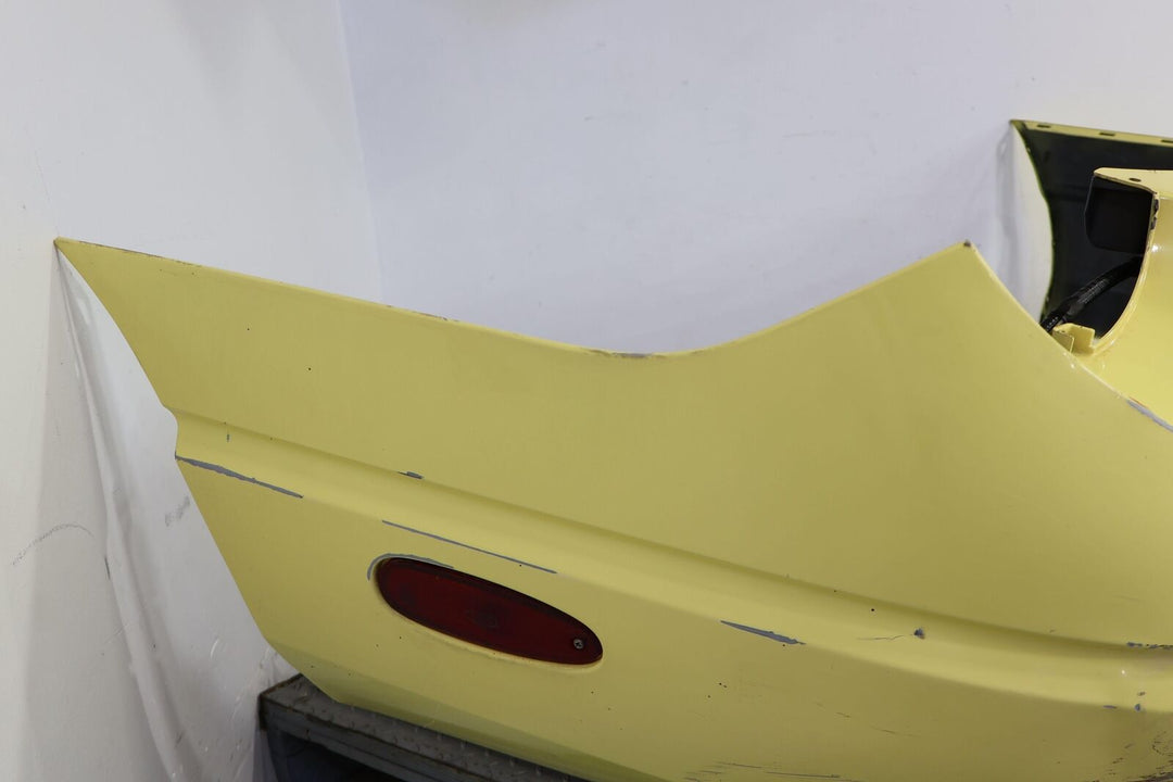 02-05 Ford Thunderbird Loaded Rear Bumper Cover (Inspiration Yellow) OEM Notes