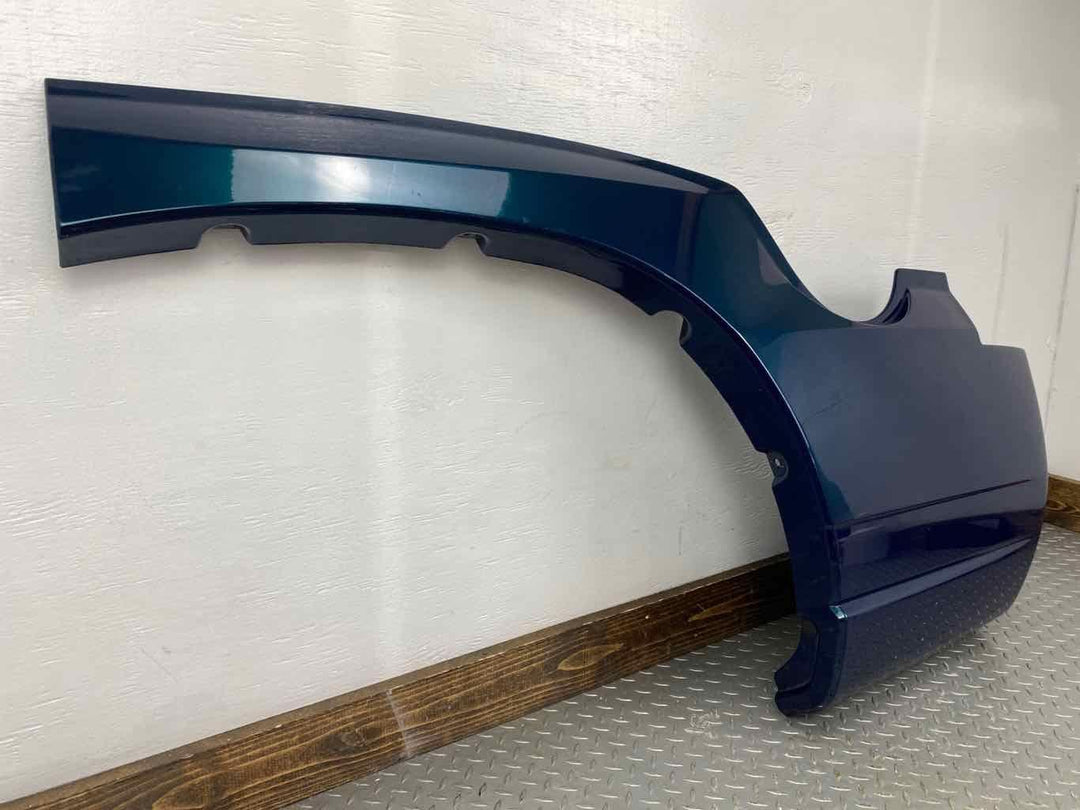 02-06 Cadillac Escalade Left Quarter Panel Moulding (Bermuda Blue 26U) Short WB