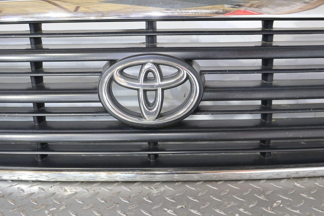 98-02 Toyota Land Cruiser Front Upper Bumper Grille (Weathered Chrome) OEM