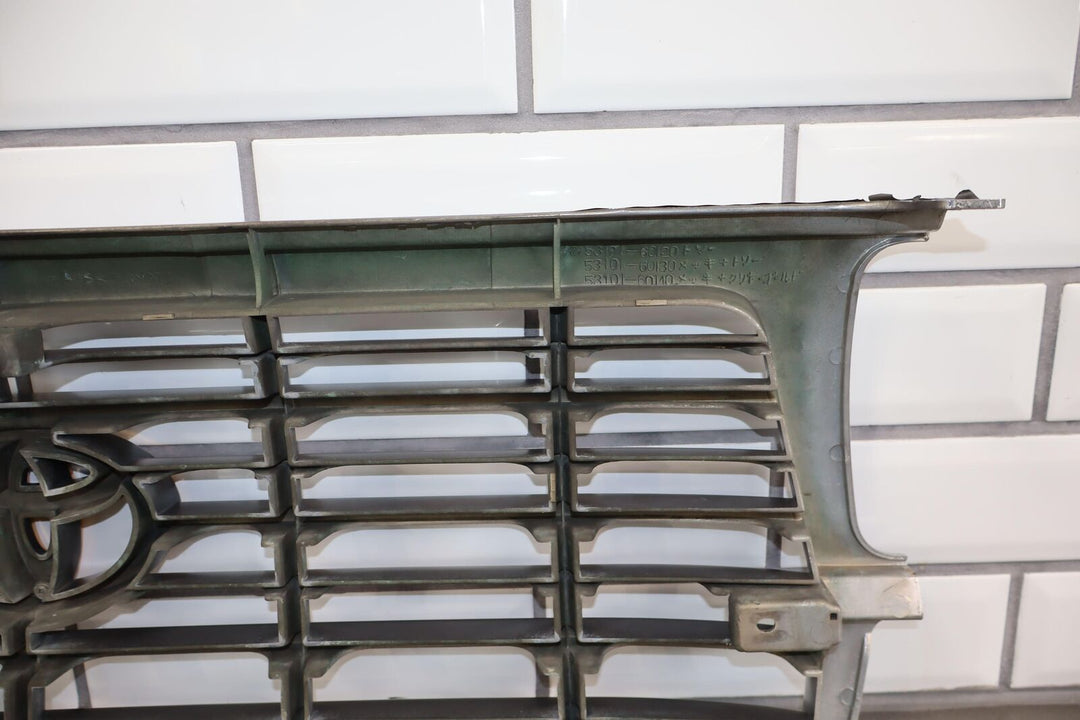 95-97 Toyota Land Cruiser OEM Upper Grille (Stone Chips/Weathered)