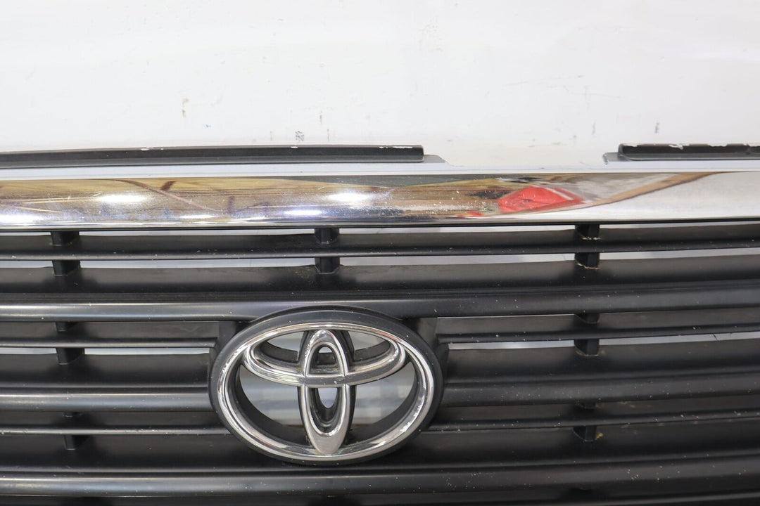 98-02 Toyota Land Cruiser Front Upper Bumper Grille (Weathered Chrome) OEM