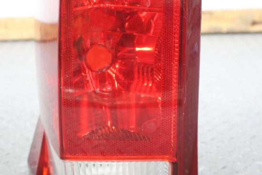 02-06 Cadillac Escalade Left LH Rear OEM Tail Light Lamp (Tested) Solid Mount