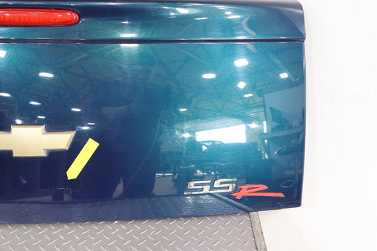 03-06 Chevy SSR Rear Tail Gate (Aqua Blur Metallic 26U)Paint Damage Below Emblem