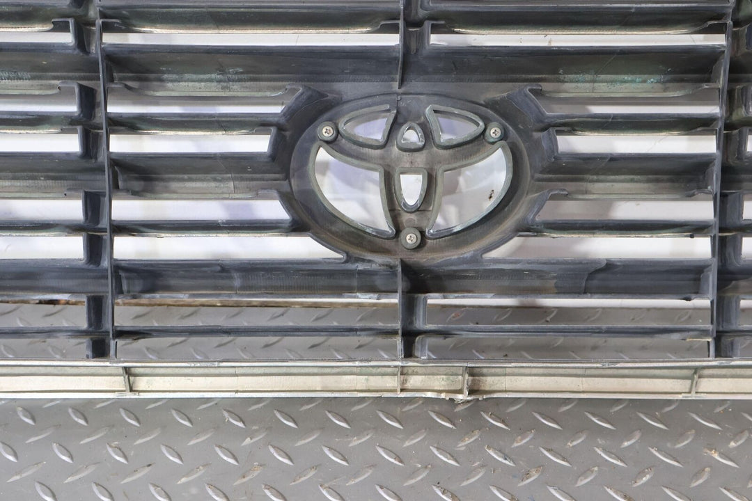 98-02 Toyota Land Cruiser Front Upper Bumper Grille (Weathered Chrome) OEM