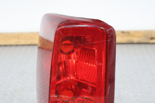 02-06 Cadillac Escalade Left LH Rear OEM Tail Light Lamp (Tested) Solid Mount