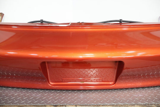 98-02 Chevy Camaro Z28 Rear OEM Bumper W/Corner Lights (Sunset Orange Metallic)