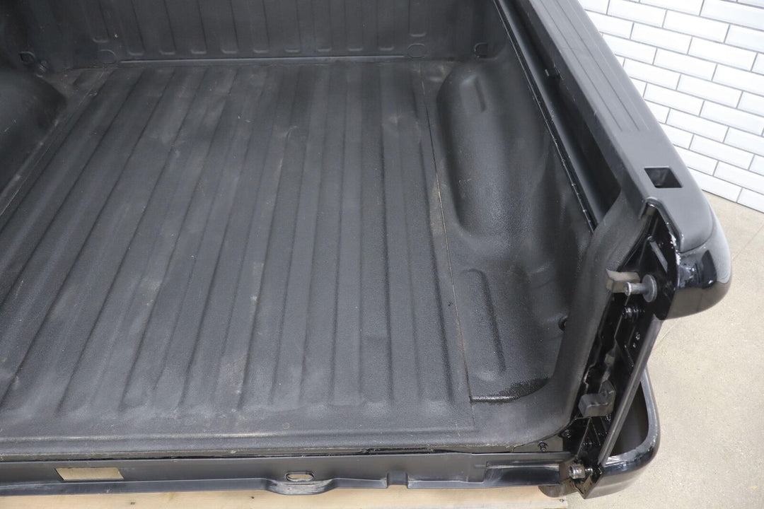 19-23 Ram 1500 Crew Cab 5'7" Bed (Diamond Black PXJ) Sold Bare (Creased)