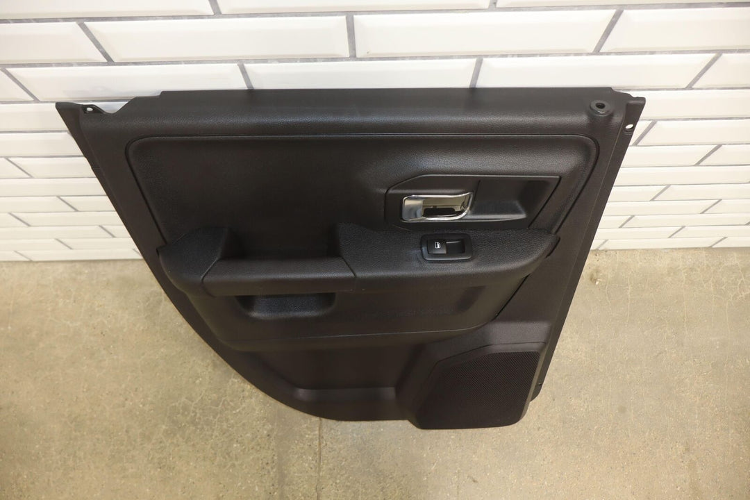 2013-2018 Ram 1500 Quad Cab Left Rear Interior Door Trim Panel (Black X9)