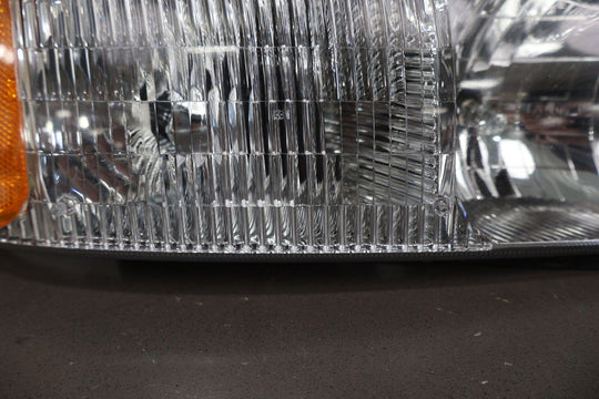 03-06 GMC Sierra Yukon Right RH Aftermarket TYC Headlight Lamp (20-5567-00-1N)