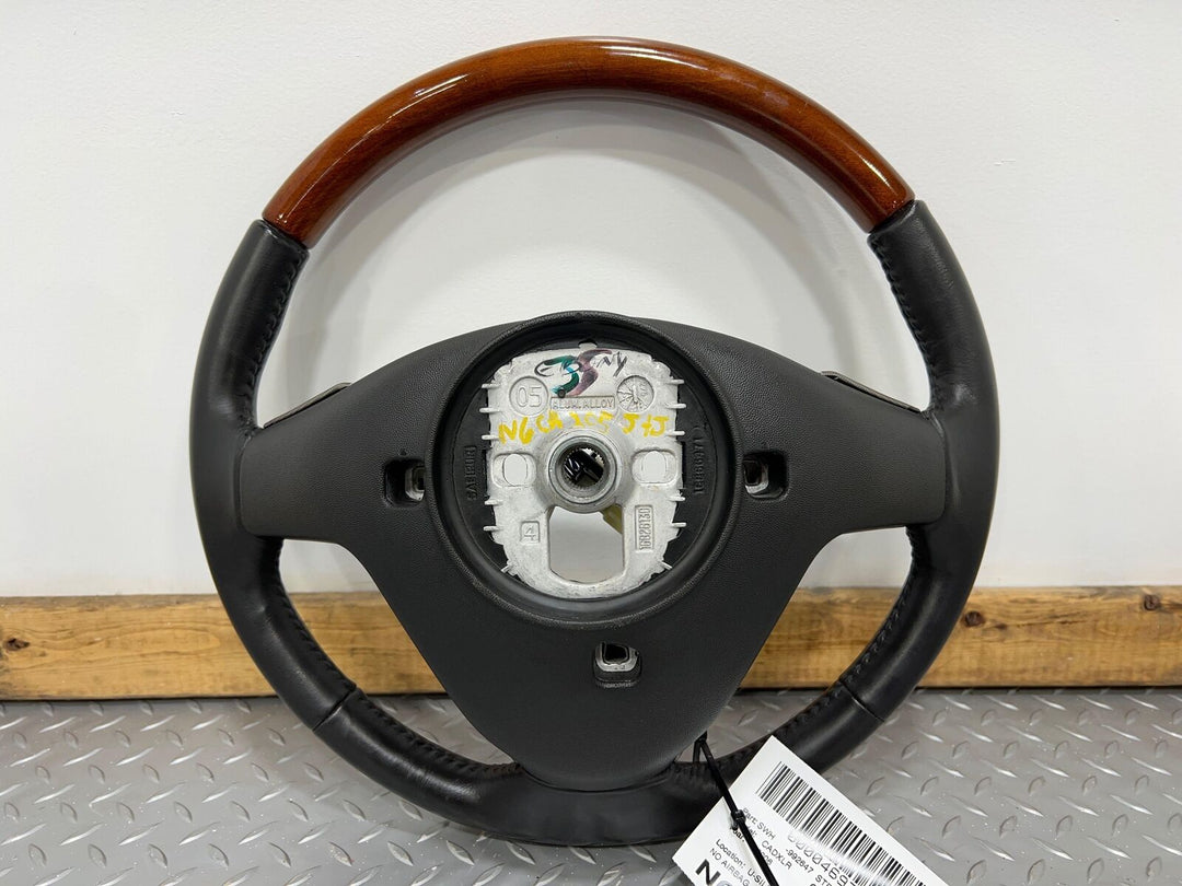 05-07 Cadillac XLR Black Leather Steering Wheel W/Wood Trim(Black 19i&Dark Wood)