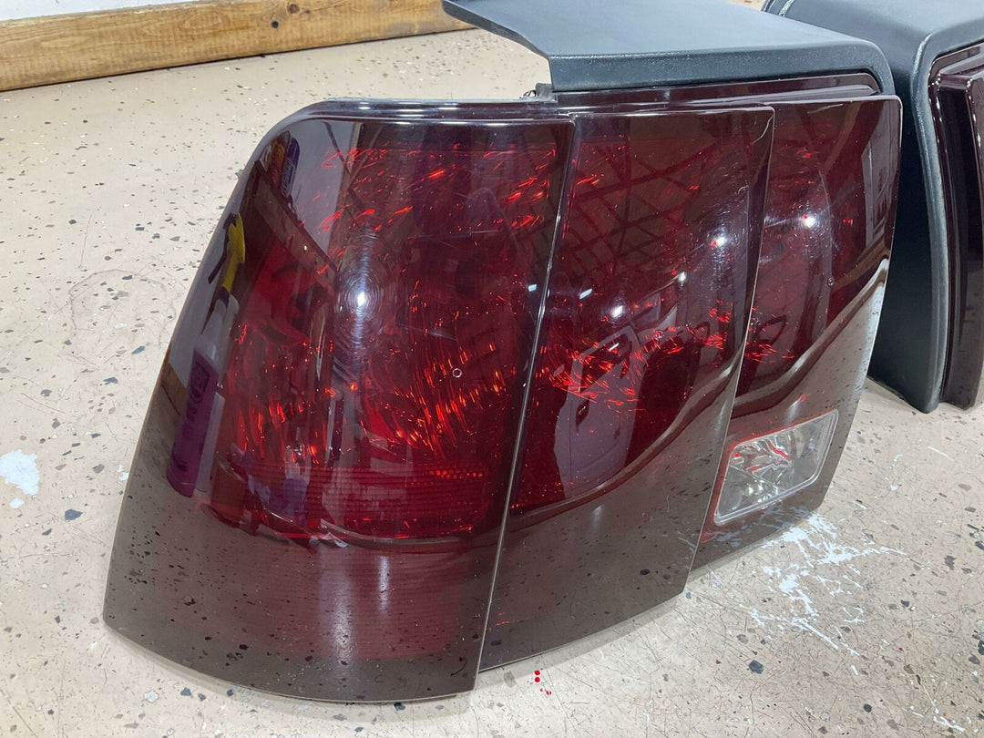 99-04 Ford Mustang Aftermarket Spray Tinted Tail Light Pair (Left/Right)