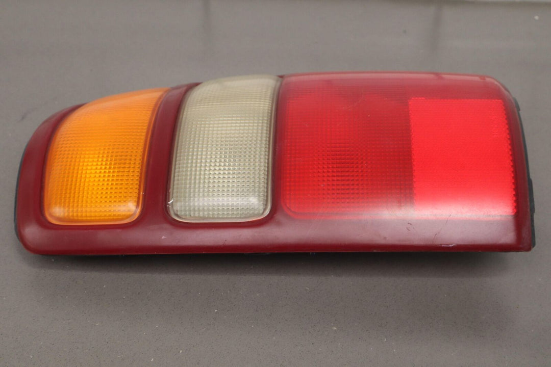 00-03 Chevy Suburban / Tahoe Driver Left OEM Tail Light Tail Lamp