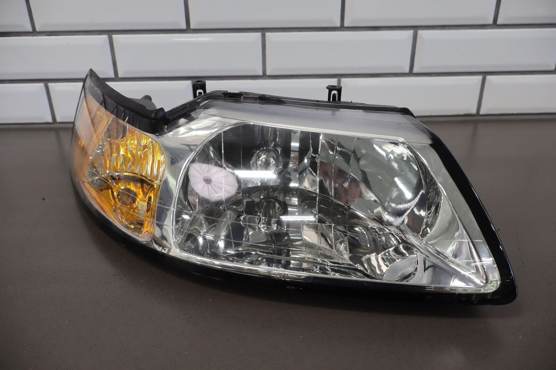 99-04 Ford Mustang TYC Aftermarket Headlight Pair (Left / Right) Clean Lenses