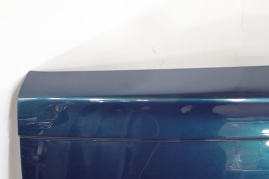 03-06 Chevy SSR Rear Tail Gate (Aqua Blur Metallic 26U)Paint Damage Below Emblem