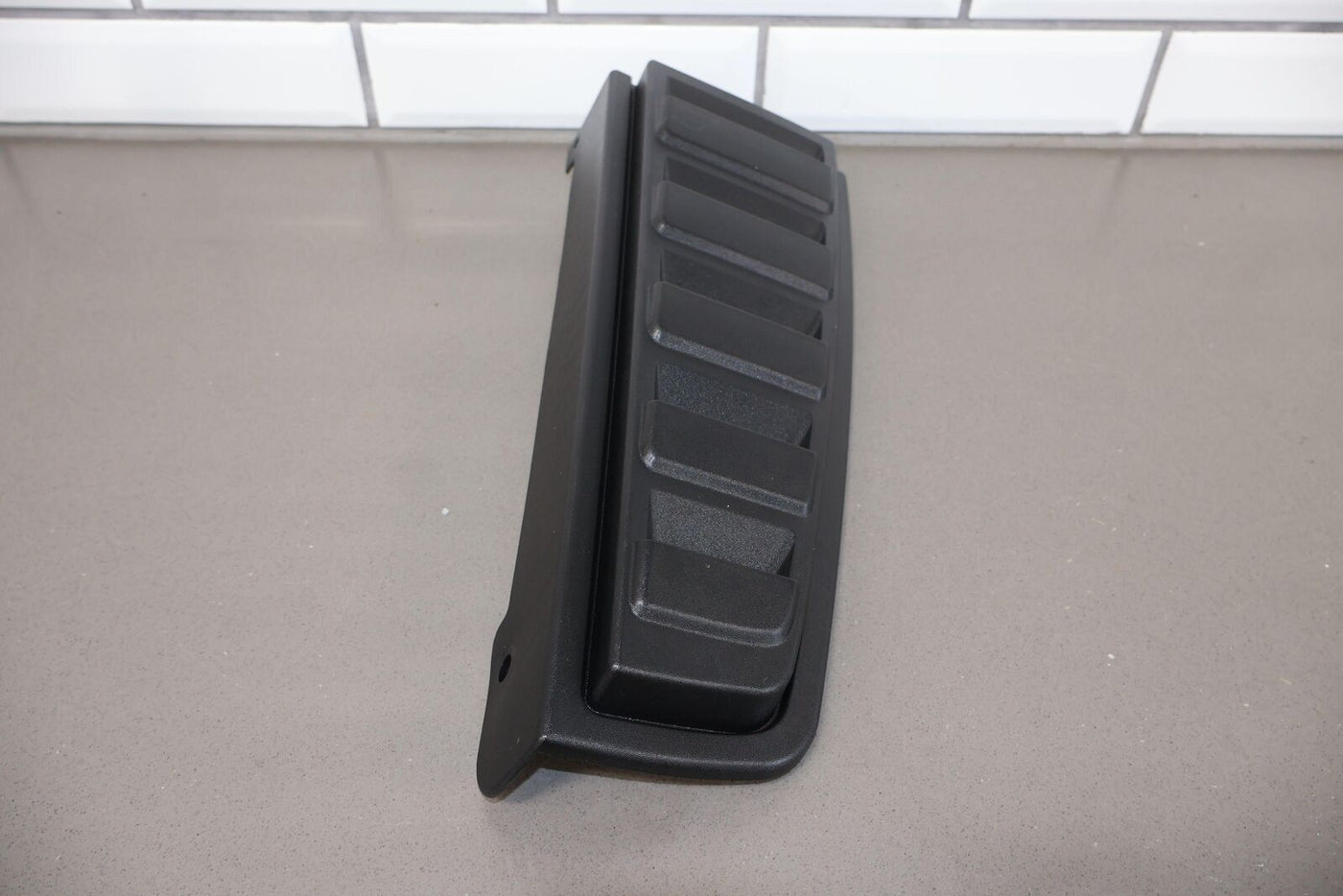 03-09 Hummer H2 Driver Left LH Tail Light Upper Trim Panel / Moulding (Black)