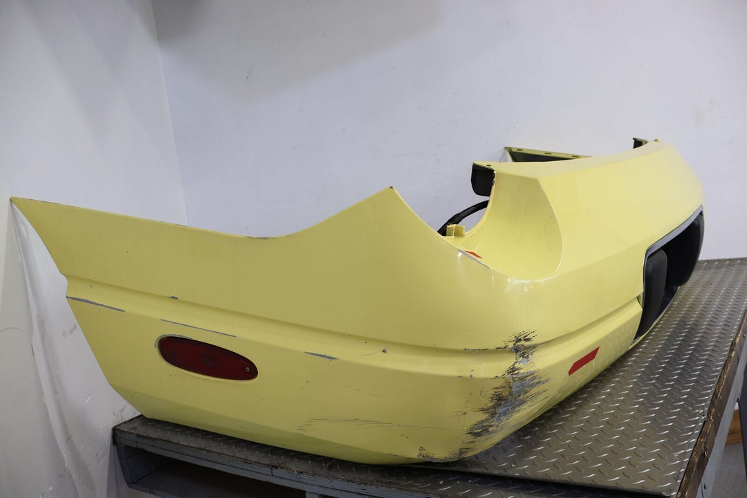 02-05 Ford Thunderbird Loaded Rear Bumper Cover (Inspiration Yellow) OEM Notes