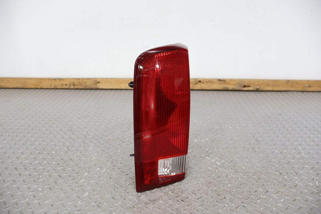 02-06 Cadillac Escalade Left LH Rear OEM Tail Light Lamp (Tested) Solid Mount