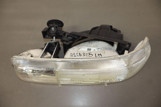 99-02 Chevy Silverado Driver Left Headlight OEM