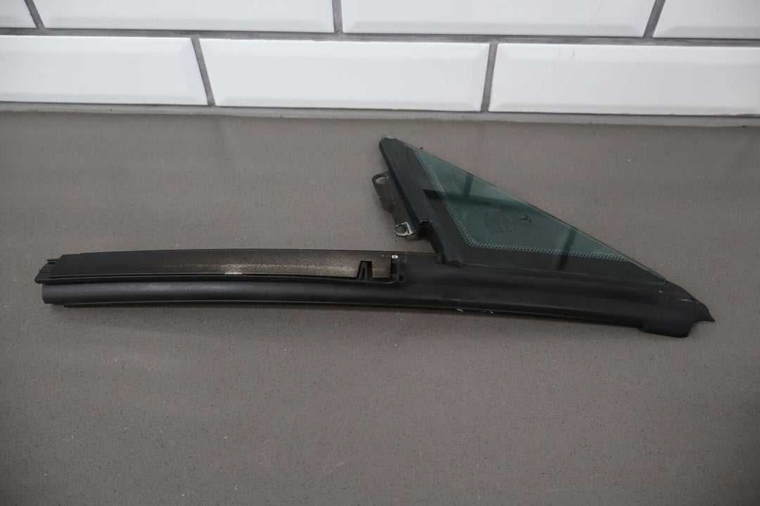 2012-2015 Tesla Model S Front Left LH Vent WIndow Glass w/ Frame (Self Tint)