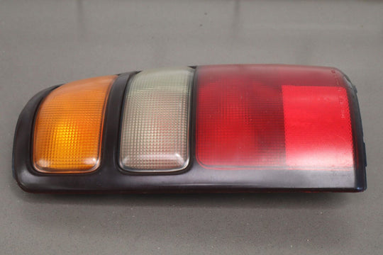 04-06 Chevy Tahoe / Suburban OEM Tail Lights (Pair Left/Right)