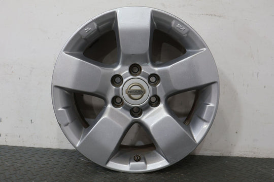 09-14 Nissan Xterra 16" OEM Rear Wheel (Face Marks) Silver With Center Cap