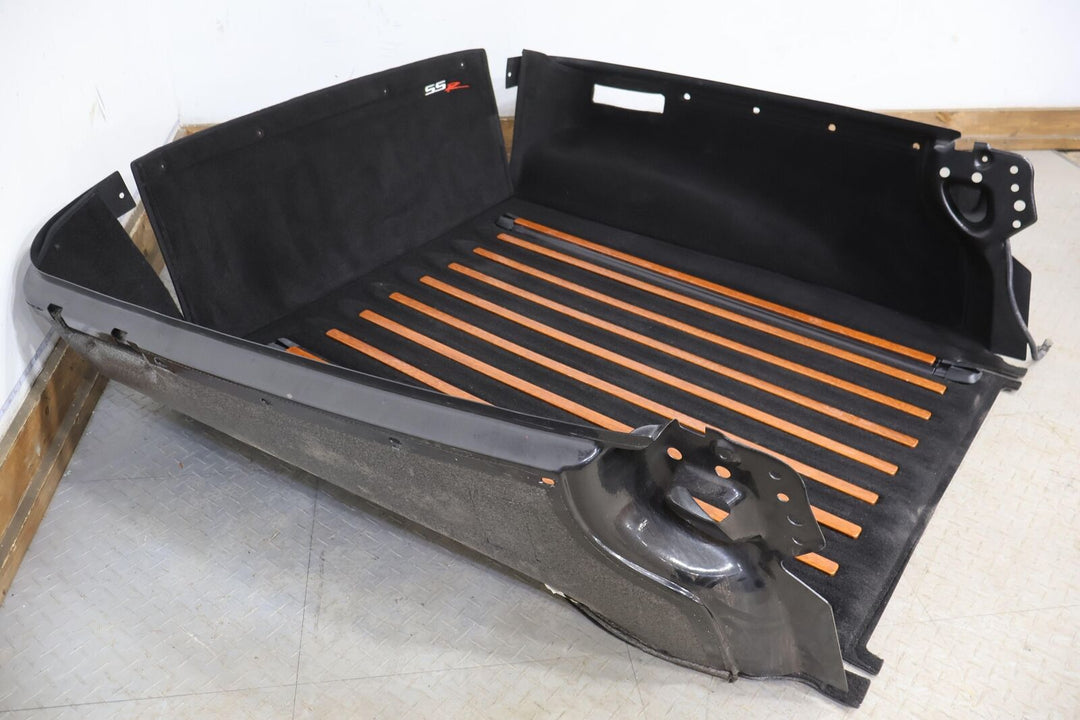 03-06 Chevy SSR Rear Carpeted Bed Cleanout W/ Woodgrain Trim (Black)