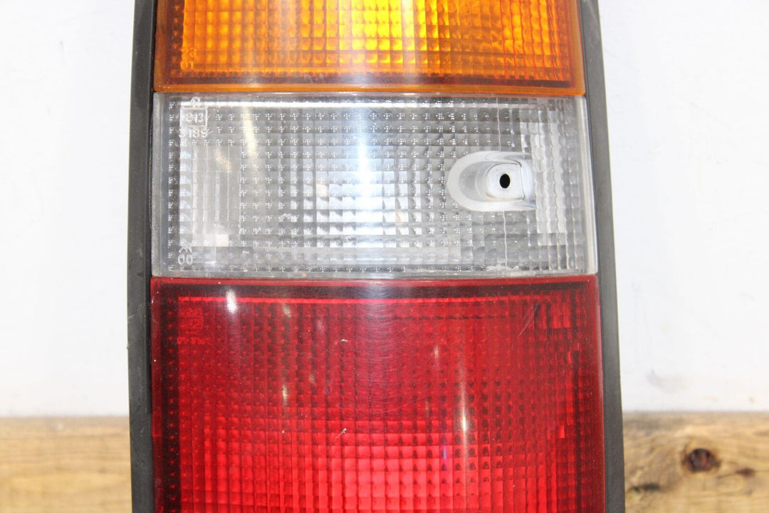 91-97 Toyota Land Cruiser Right RH Passenger Tail Light OEM (Mounted Solid)