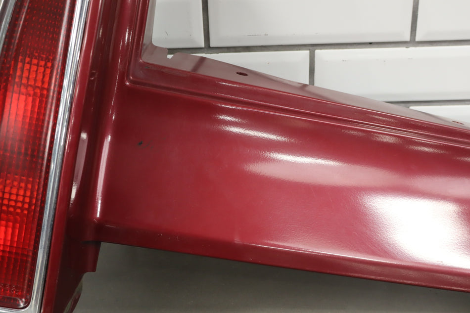 1993-1996 Cadillac Fleetwood Left Tail Light W/ Filler Panel Garnet Red 72