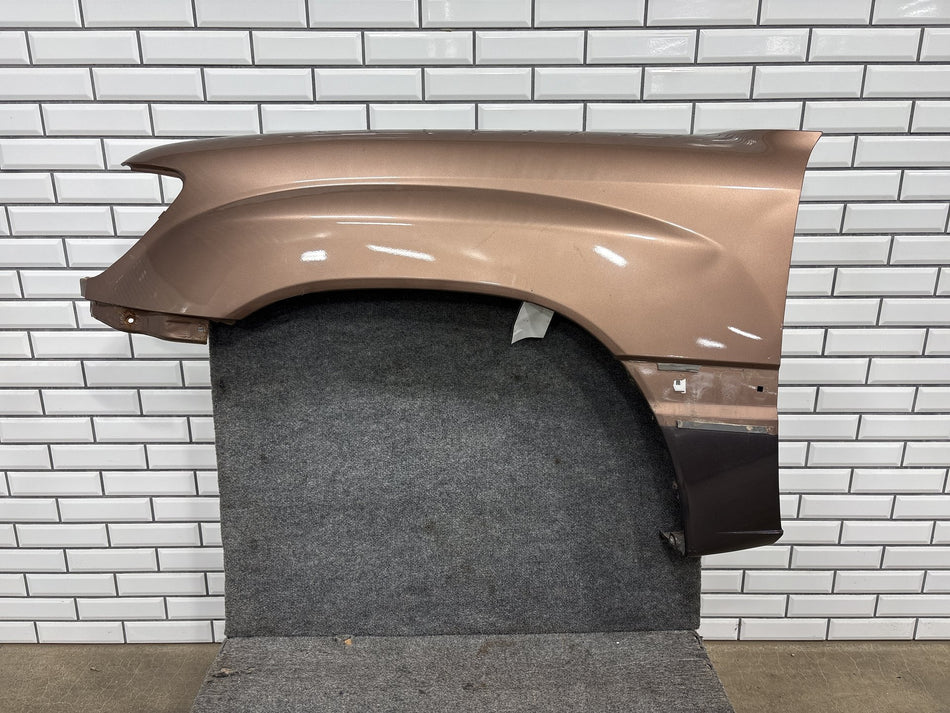 98-05 Toyota Land Cruiser J100 Left Fender Desert Bronze 4P3 (Bracket Rust)
