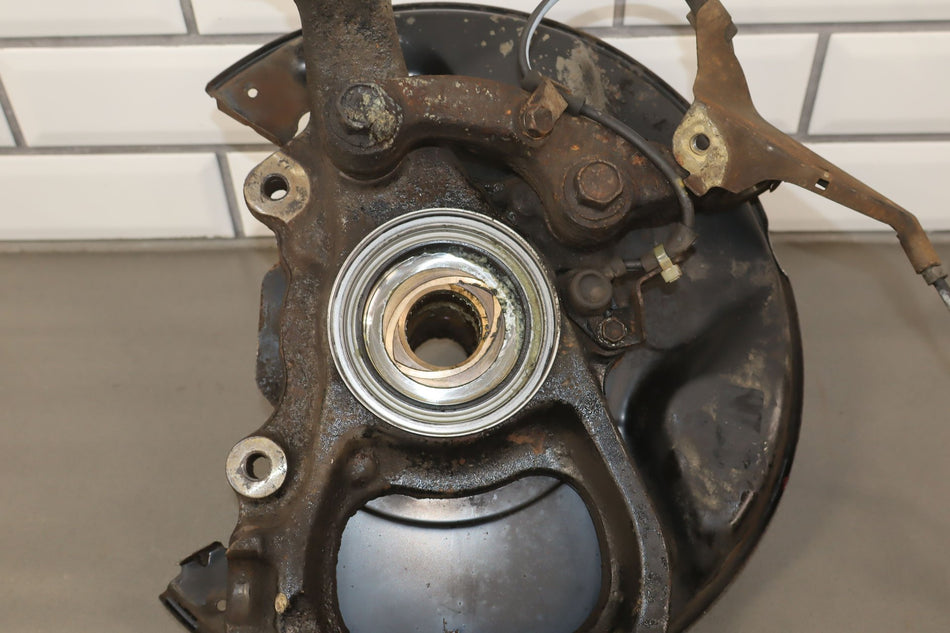 2000 Toyota Land Cruiser- Left Front Spindle