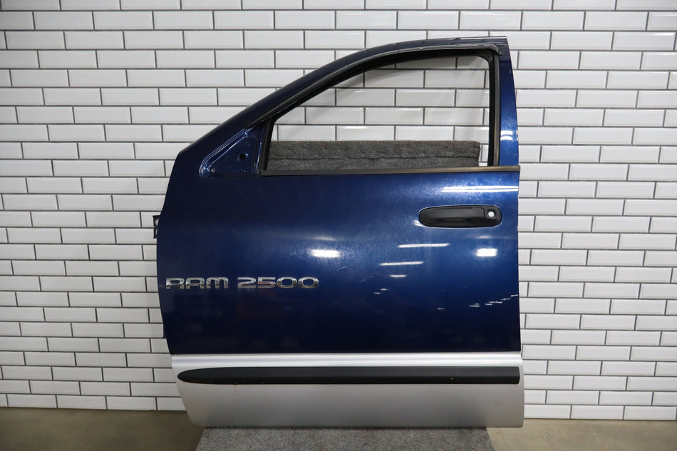 02-08 Dodge Ram Quad LF Door 55275853AG Less Mirror
