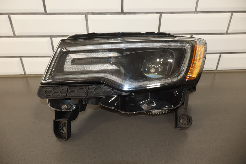 2012 Jeep Grand Cherokee- Left Headlamp