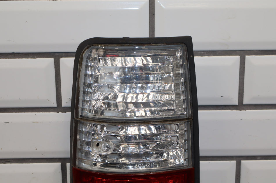 1991-1997 Toyota Land Cruiser Left Tail Light 8155060320 OEM