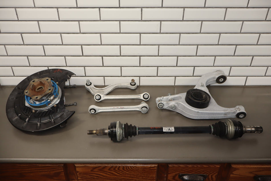 2010 Porsche Panamera 4s Left Rear Suspension Control Arm Spindle Axle OEM