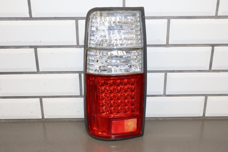 1991-1997 Toyota Land Cruiser Left Tail Light 8155060320 OEM