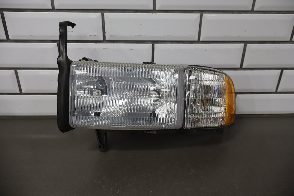 1994-2001 Dodge Ram 1500 Left Headlamp OEM w/Bracket