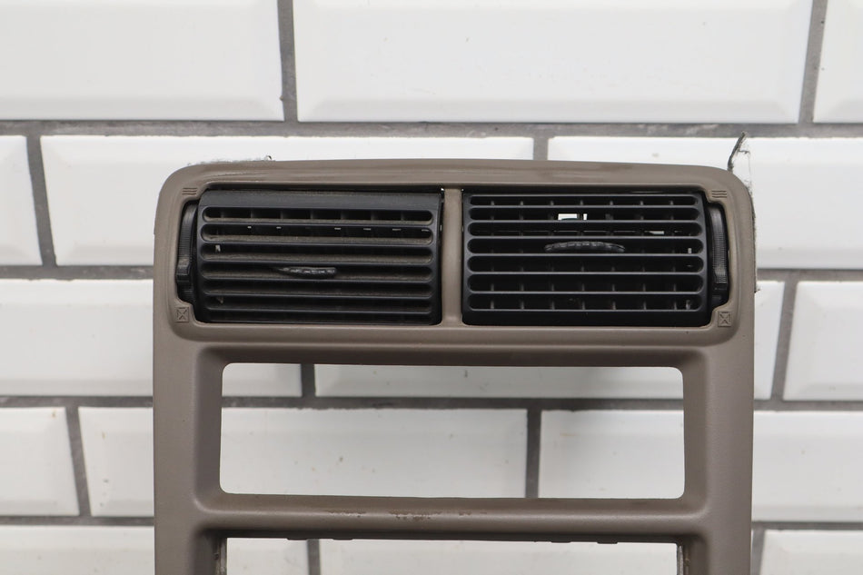 99-04 Ford Mustang Center Dash Radio Bezel w/ A/C Vents Parchment Tan OEM