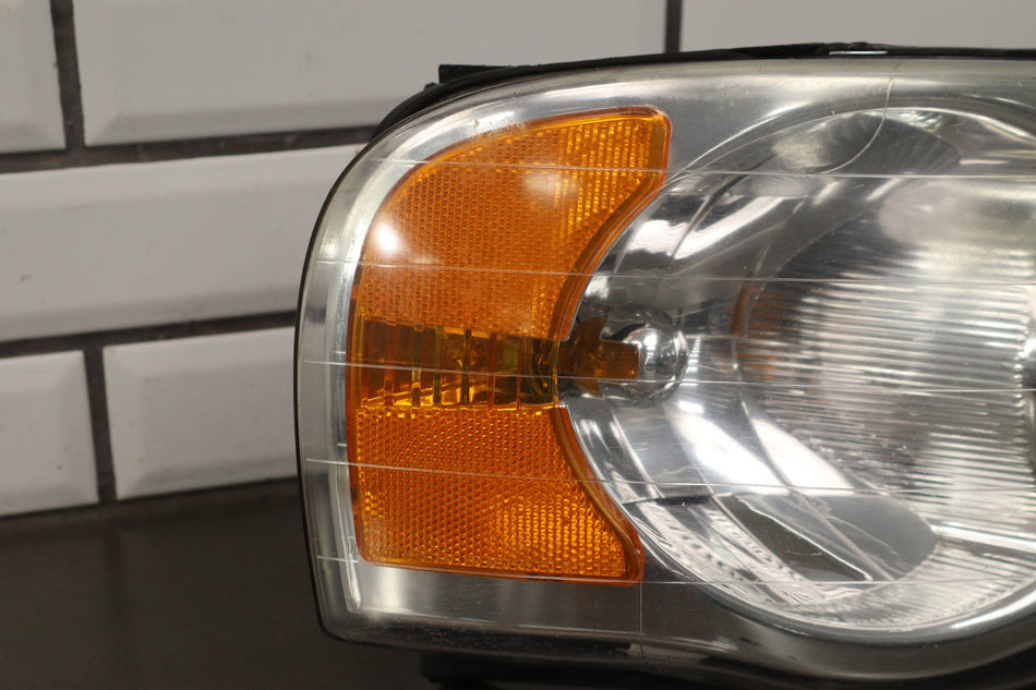 02-05 Dodge Ram RH Headlight OEM 55077120AG
