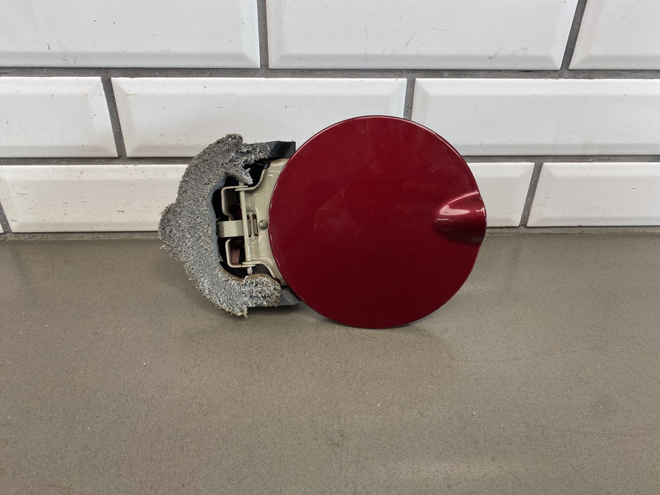 09-18 Ram 1500 Fuel Filler Door Delmonico Red
