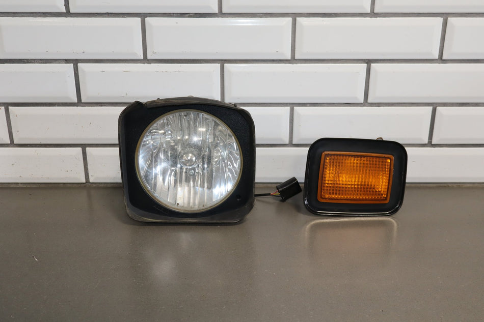 2003-2009 Hummer H2 Left Headlamp W/ Amber Marker Lamp 20821229