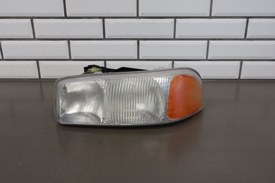 1999-2006 GMC Sierra 2500 Left Headlamp 15850351