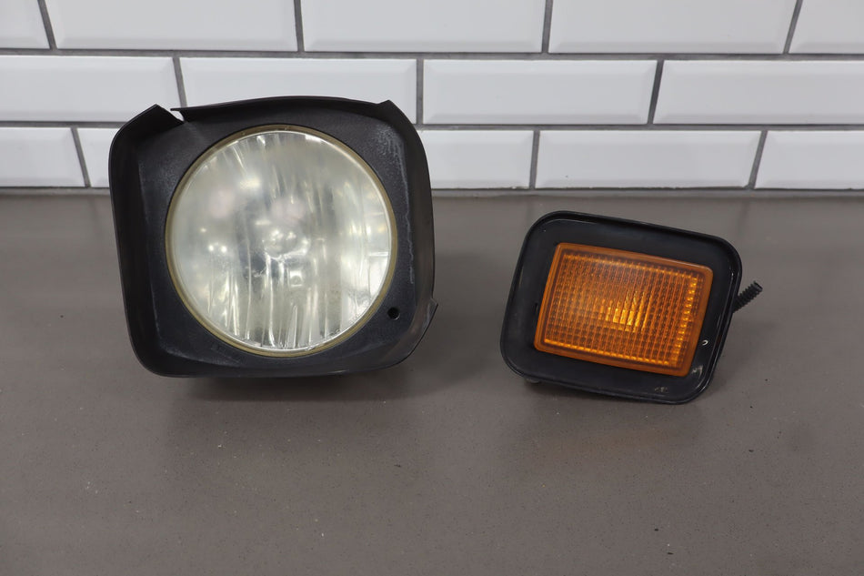 2003-2009 Hummer H2 Left Headlamp W/ Amber Marker Lamp 20821229