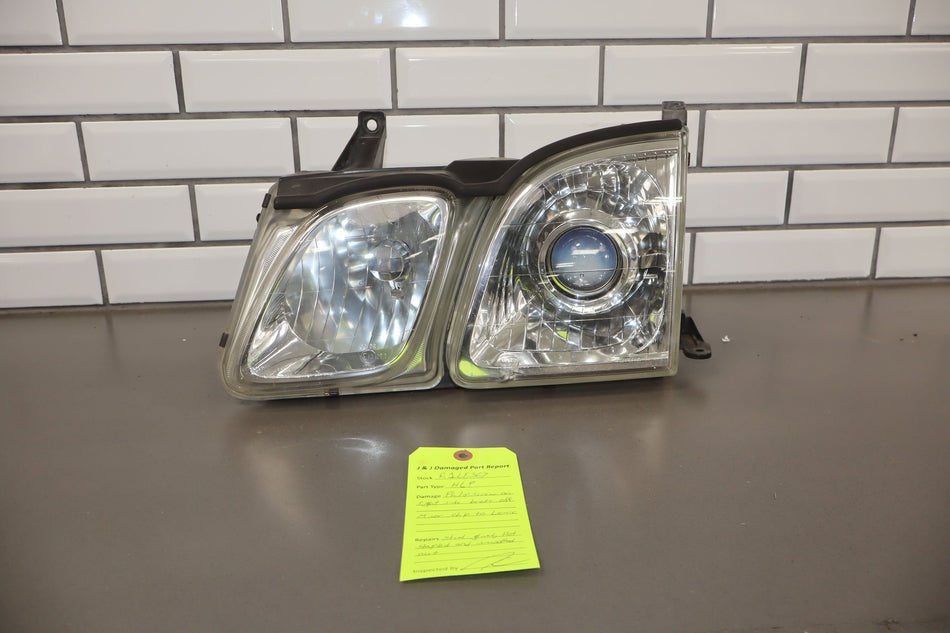 1998-2002 Lexus LX470 Glass Left Headlamp 8115060802