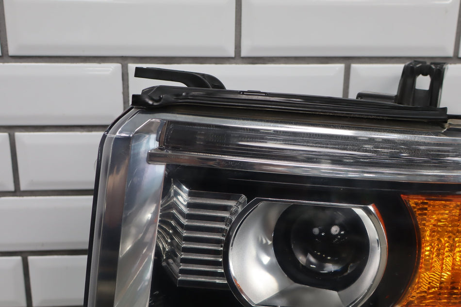 2014-2015 GMC Sierra 1500 Left Headlamp Halogen/ LED 23130715