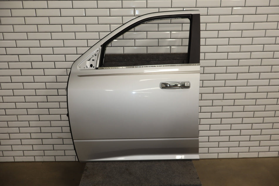 09-18 Ram 1500/2500/3500 Quad/Crew Cab Left Front Door Bright Silver QS2