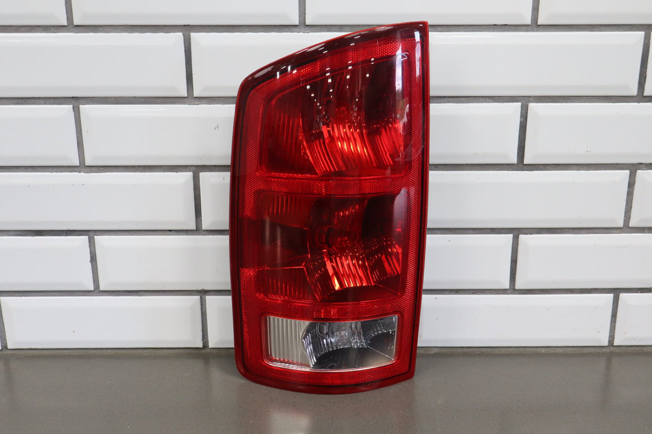 2002-2006 Ram 1500 Left Tail Light 55077347AC OEM