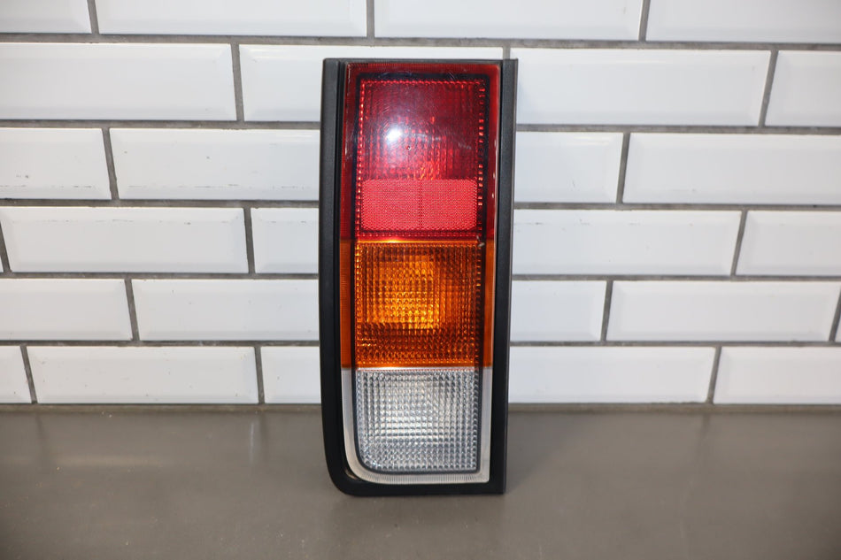 2003-2004 Hummer H2 Left Tail Light 15193458 OEM
