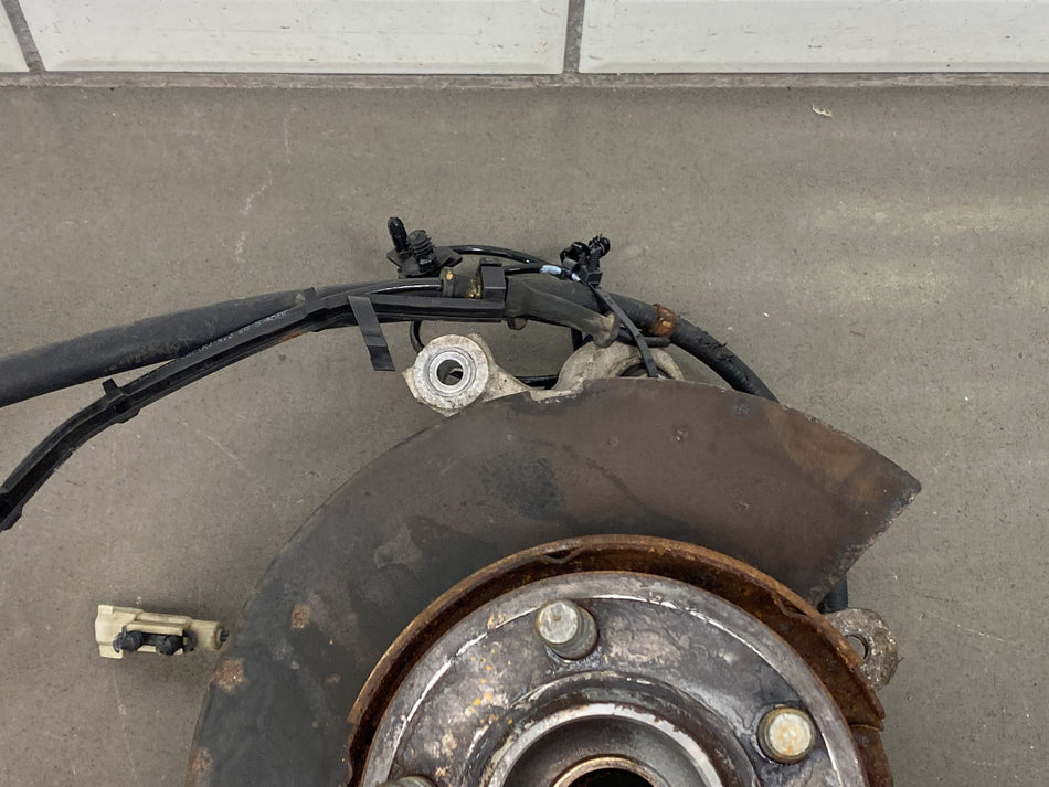 2011-2014 Dodge Challenger Left Rear Suspension Knuckle Spindle OEM