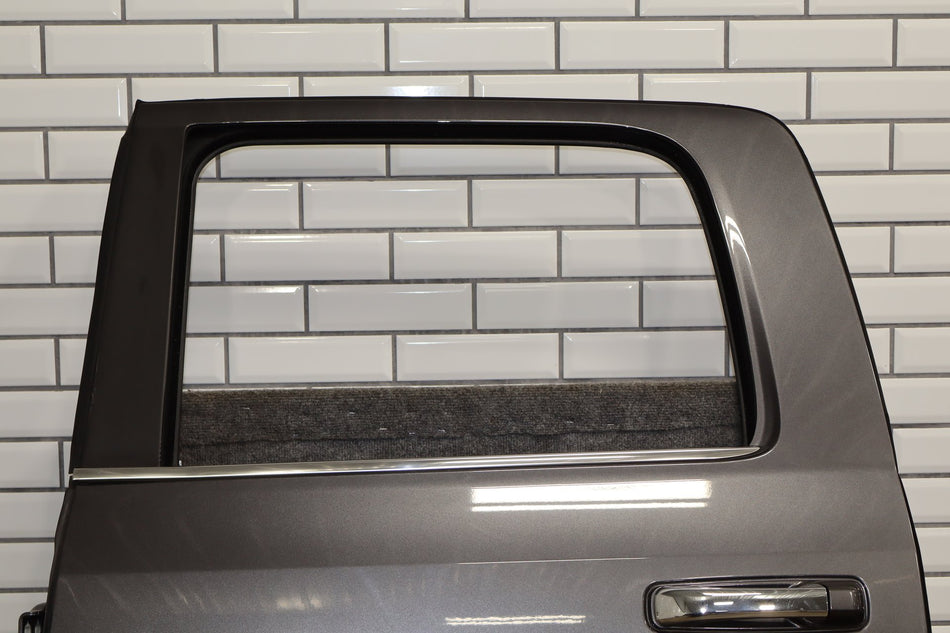 2009-2018 Ram 1500 Crew Left Rear Door Granite Crystal PAU