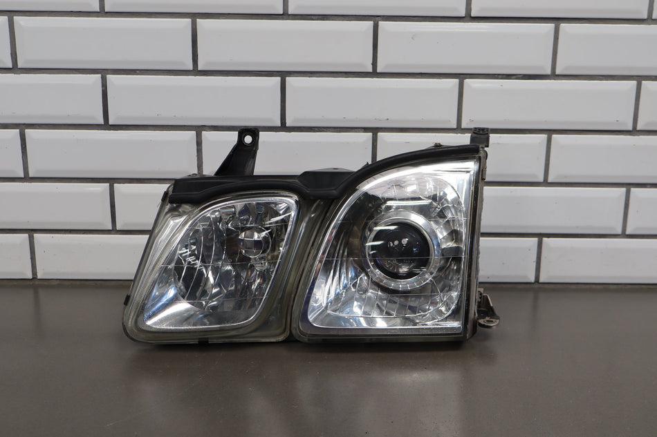 1998-2002 Lexus LX470 Glass Left Headlamp 8115060802